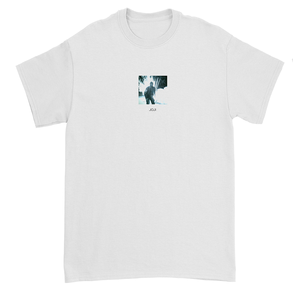 White t-shirt with a small black and white photograph printed on the chest.